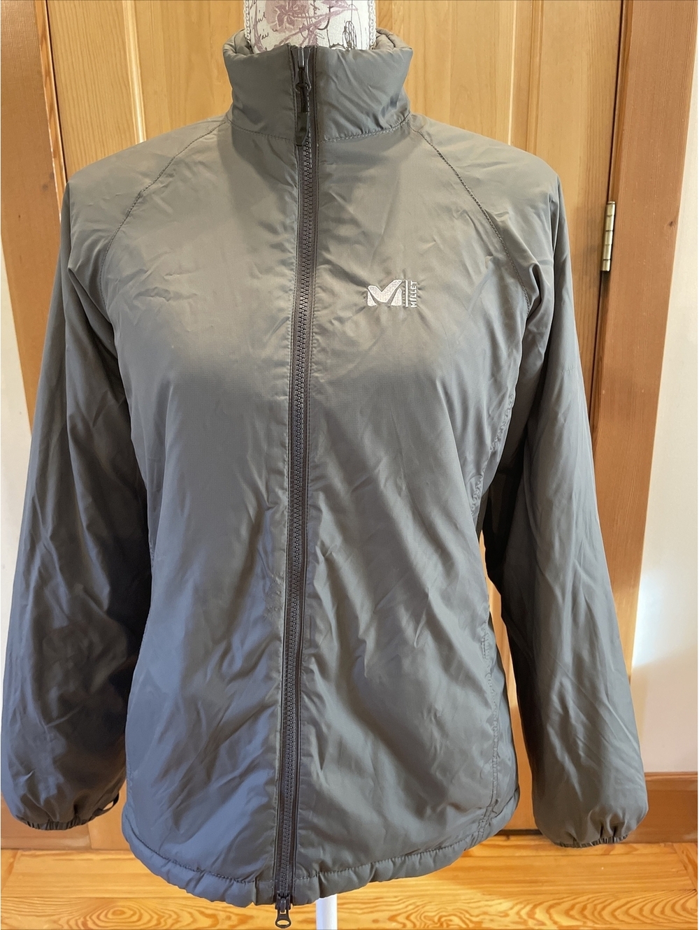 Women’s Millet Jacket Size Medium. Mid weight Full Zip. Storm Collar.